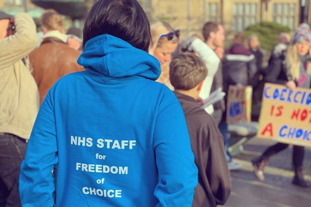 Healthcare workers protesting vaccine mandates